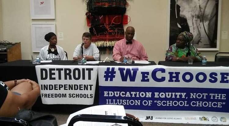 Michigan We Choose members and community residents in Benton Harbor shown at a meeting to discuss the proposed closure of Benton Harbor High School.