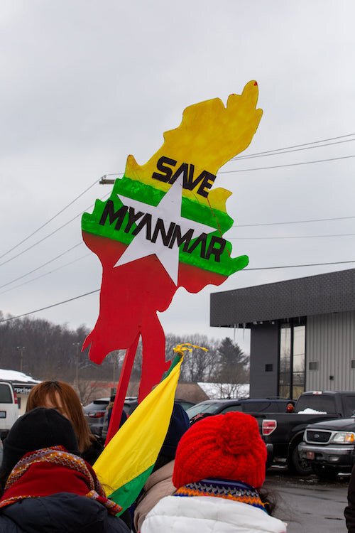 The Battle Creek Burmese community group held up signs and chanted as the President’s motorcade made its way from the Kalamazoo/Battle Creek International Airport to the Pfizer facility on Portage Road.