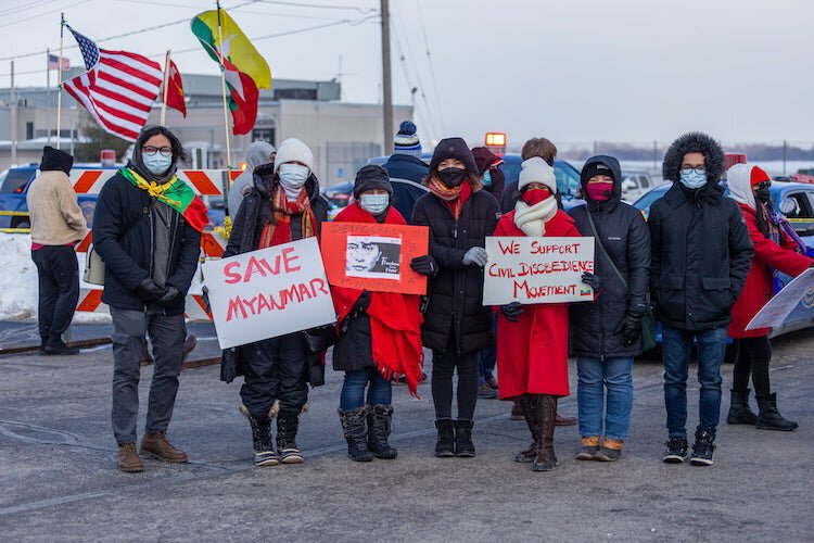 Members of the Battle Creek Burmese community turned out for President Joe Biden's visit to the Pfizer plant in Portage to ask for his support in the fight against the military coup in Myanmar. 