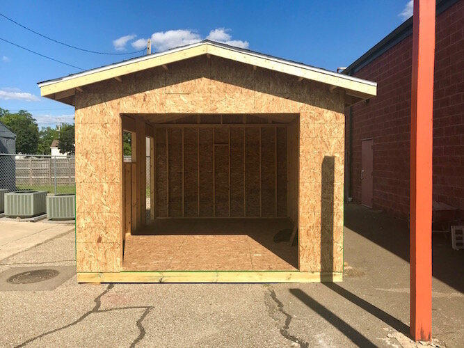 This 12- by 16-foot shed is a hands-on project of the new pre-apprentice construction training program operating at the Northside Association for Community Development. It is located on the north side of the association’s 612 N. Park St. offices.