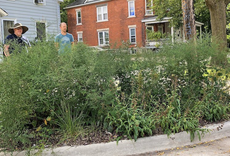 Joe Byars (left) and Mitch Lettow at a corner of Vine and Oak streets in Kalamazoo.