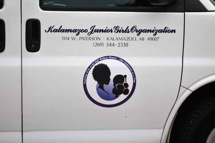 Program participants ride to various activities in the organizations white van.