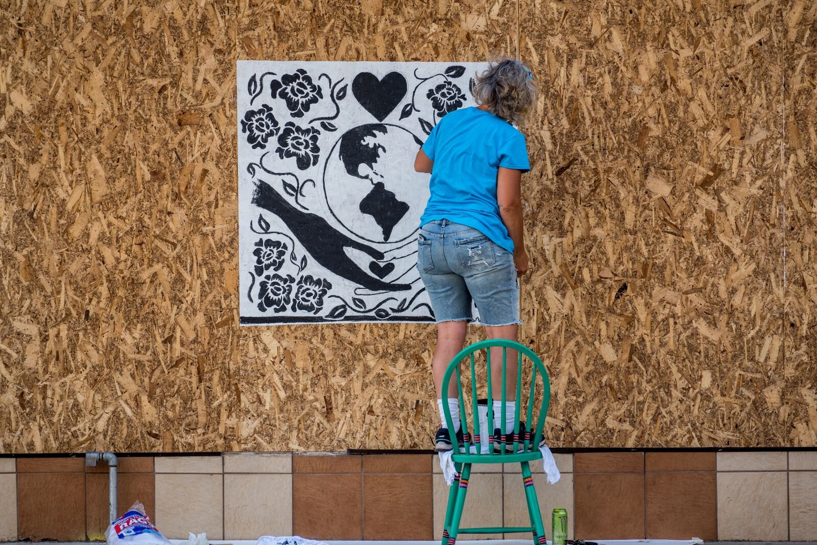 Artists converged on downtown Kalamazoo Saturday and Sunday to turn boarded up storefronts into art spaces.