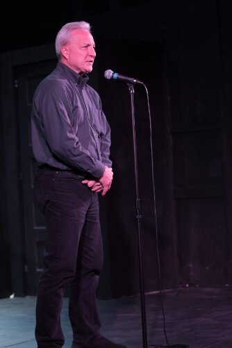 Tammy Taylor's husband Gary Hurd takes the mic at  he retirement gathering saluting her years as executive director of the Edison Neighborhood Association.