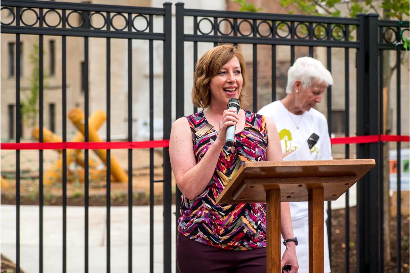 60th House District Rep. Julie Rogers offers remarks at the grand opening of Children’s Nature Playscape at Bronson Park.