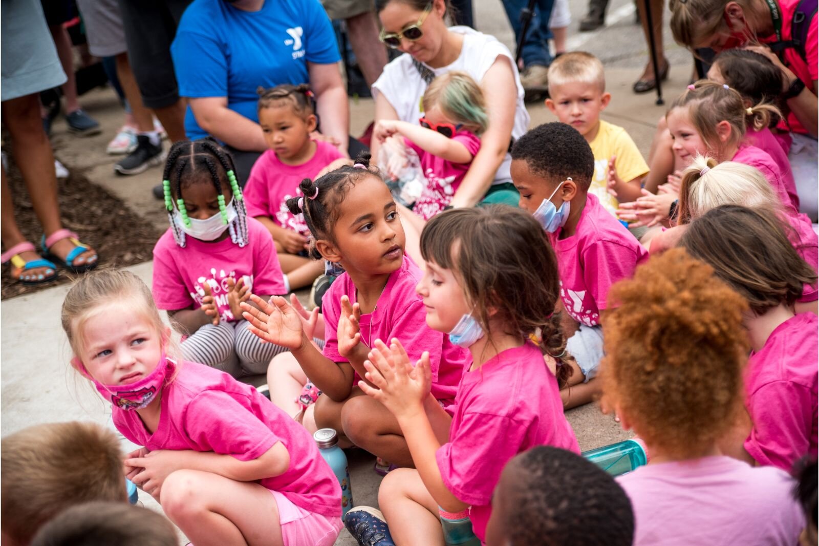 Children waited for their turn inside the gates to the Children’s Nature Playscape at Bronson Park. . 