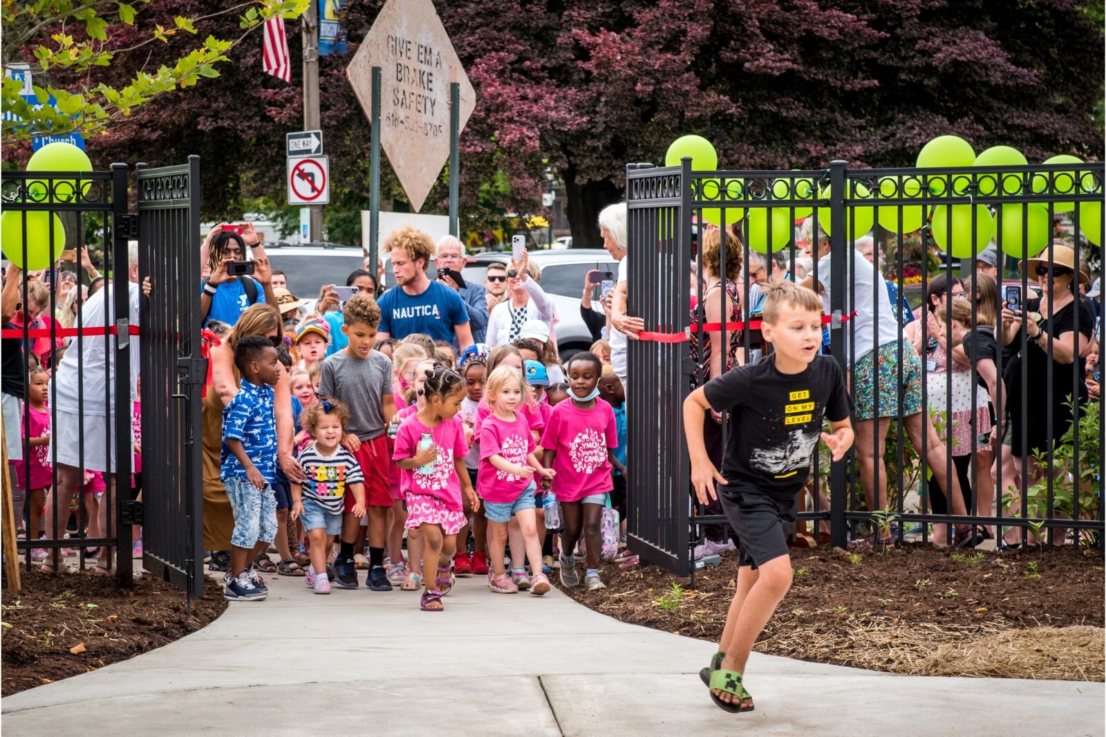 The gates opened and the children were off to try out the new playscape.