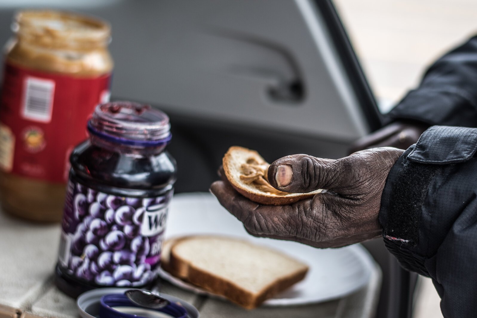 Jan van Schaik regularly parks his car in the north-east area of downtown Kalamazoo, to give food to people without shelter.