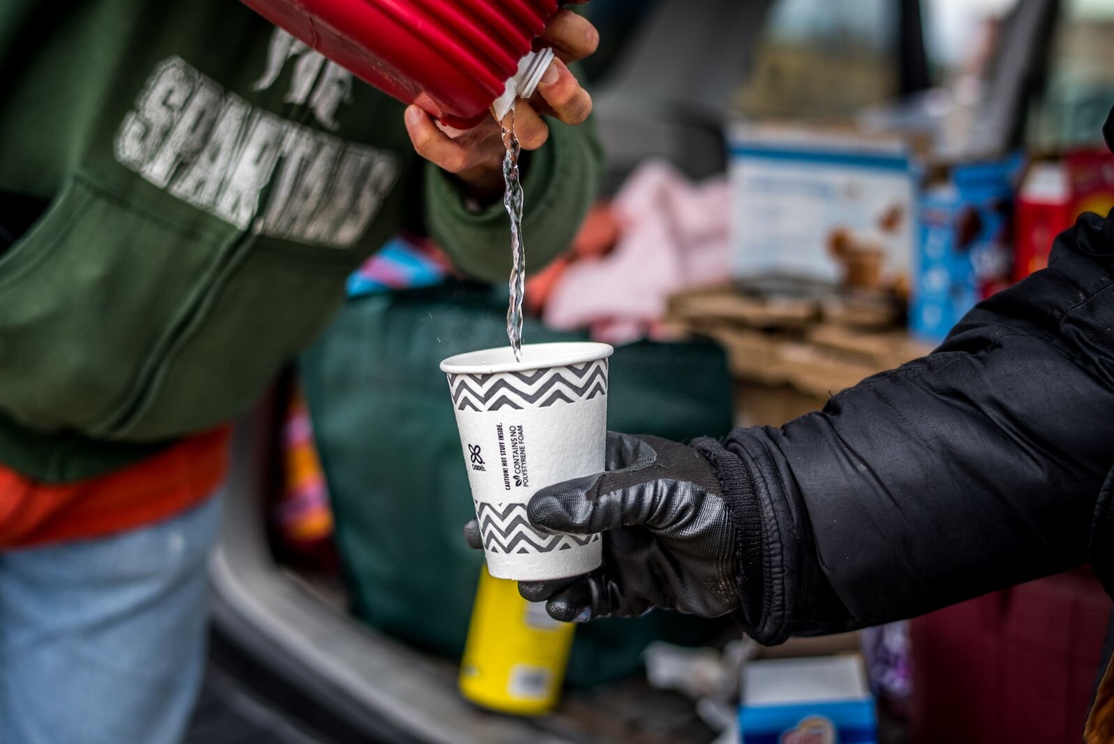 Jan van Schaik regularly parks his car in the north-east area of downtown Kalamazoo, to give food to people without shelter.