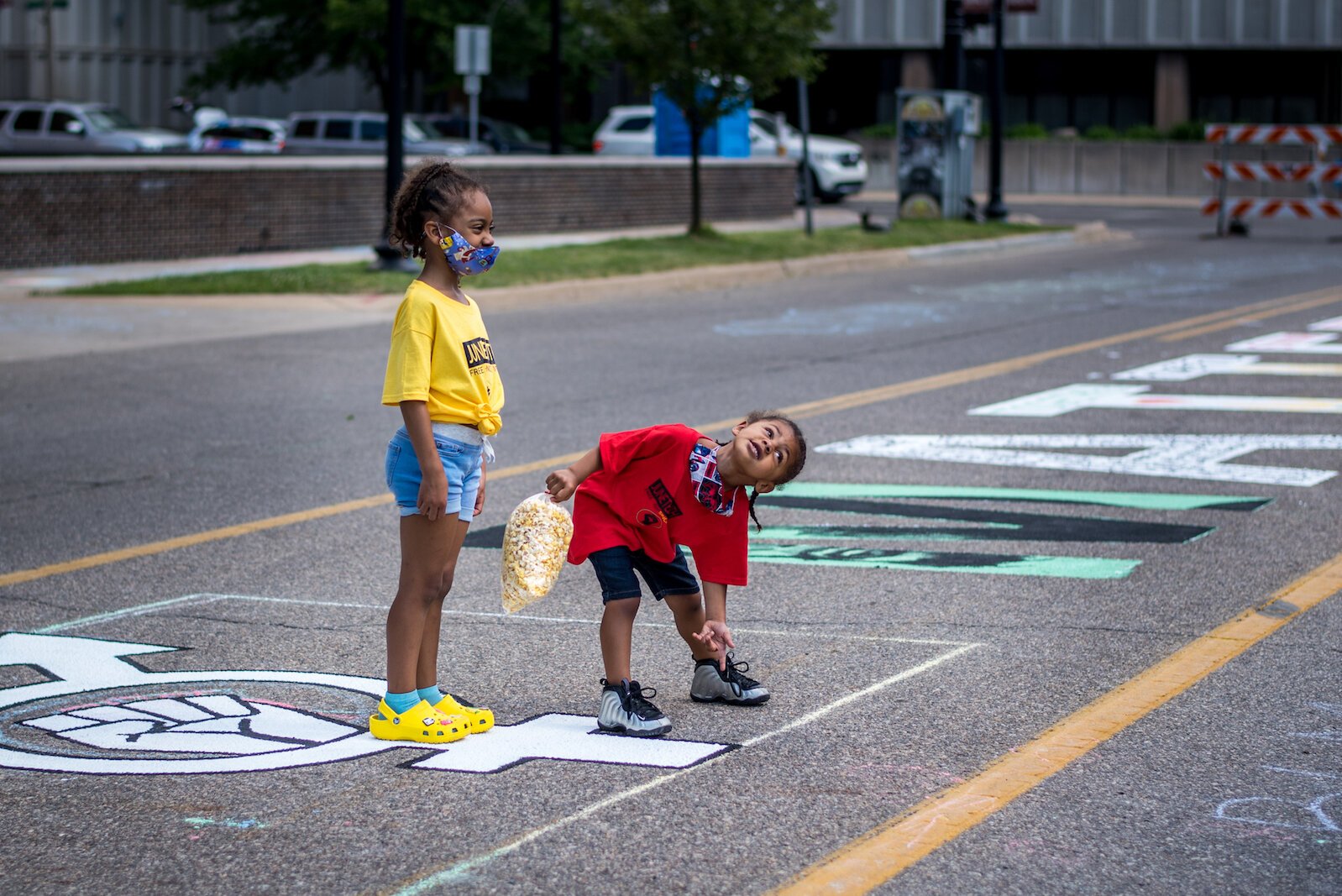 Enjoying the creation of the Black Lives Matter mural on Rose Street, between Lovell and South streets painted on Friday afternoo