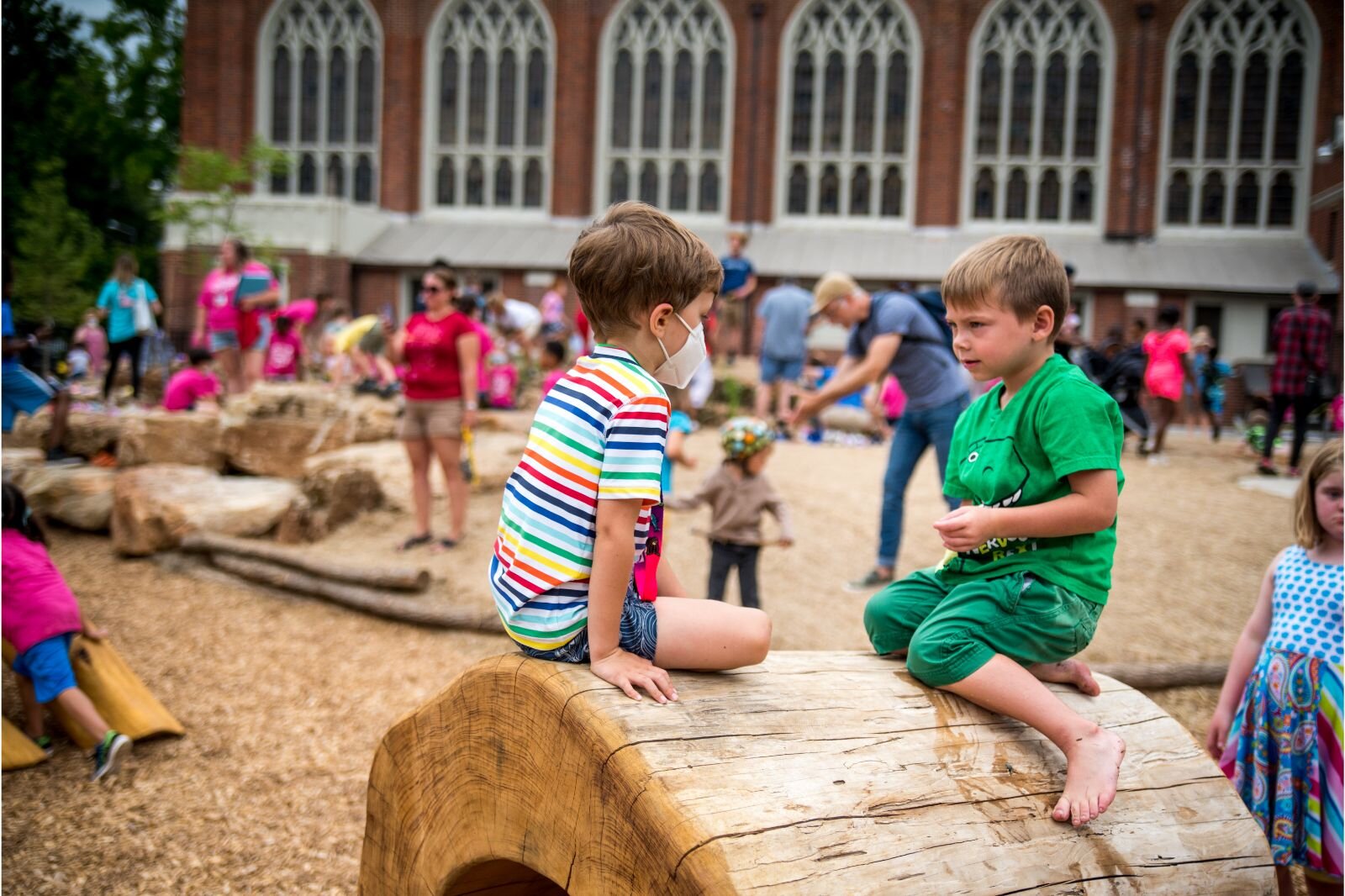 Climbing and playing on huge wooden features.