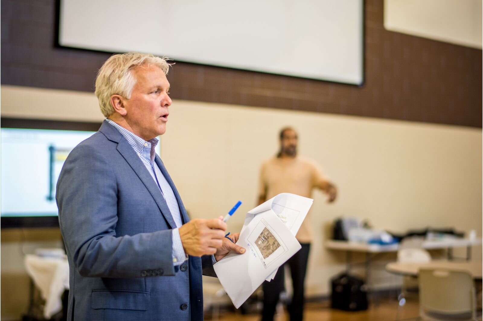 Michael Flynn, of Byce & Associates architectural and engineering firm, talks about the planned senior housing complex during a July 21, 2022 community input session. 