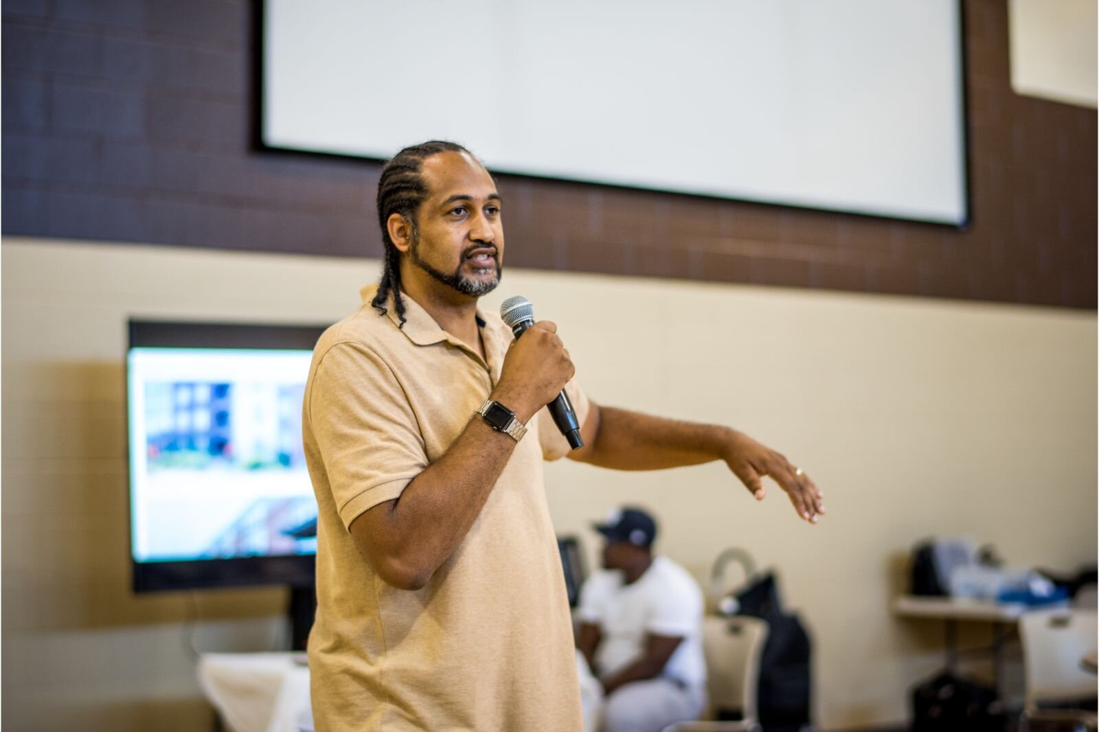 Hayward Babineaux, an architectural associate with Byce & Associates, talks about the Mt. Zion affordable senior housing project at a July 21, 2022 gathering at the church.