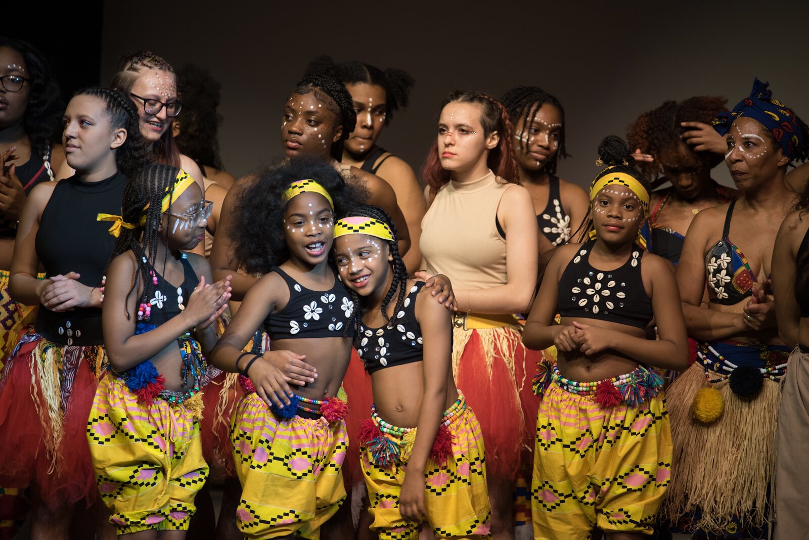 This photo was taken at the Rootead Youth Drum & Dance Ensemble (RYDDE) Showcase in December 2023. "It was a joyous event," says photographer Fran Dwight, "and then these girls came out and they were just smiling and having the time of their lives."