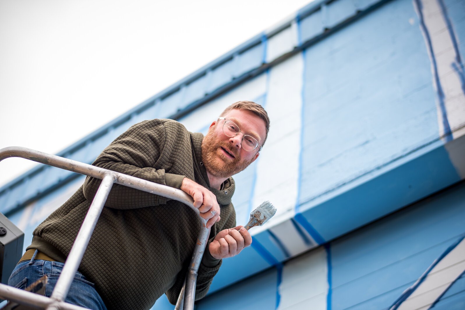 Artist and muralist Patrick Hershberger says, "When I saw this building, personally, it was four blank canvasses But I want those canvasses to be community-oriented." 