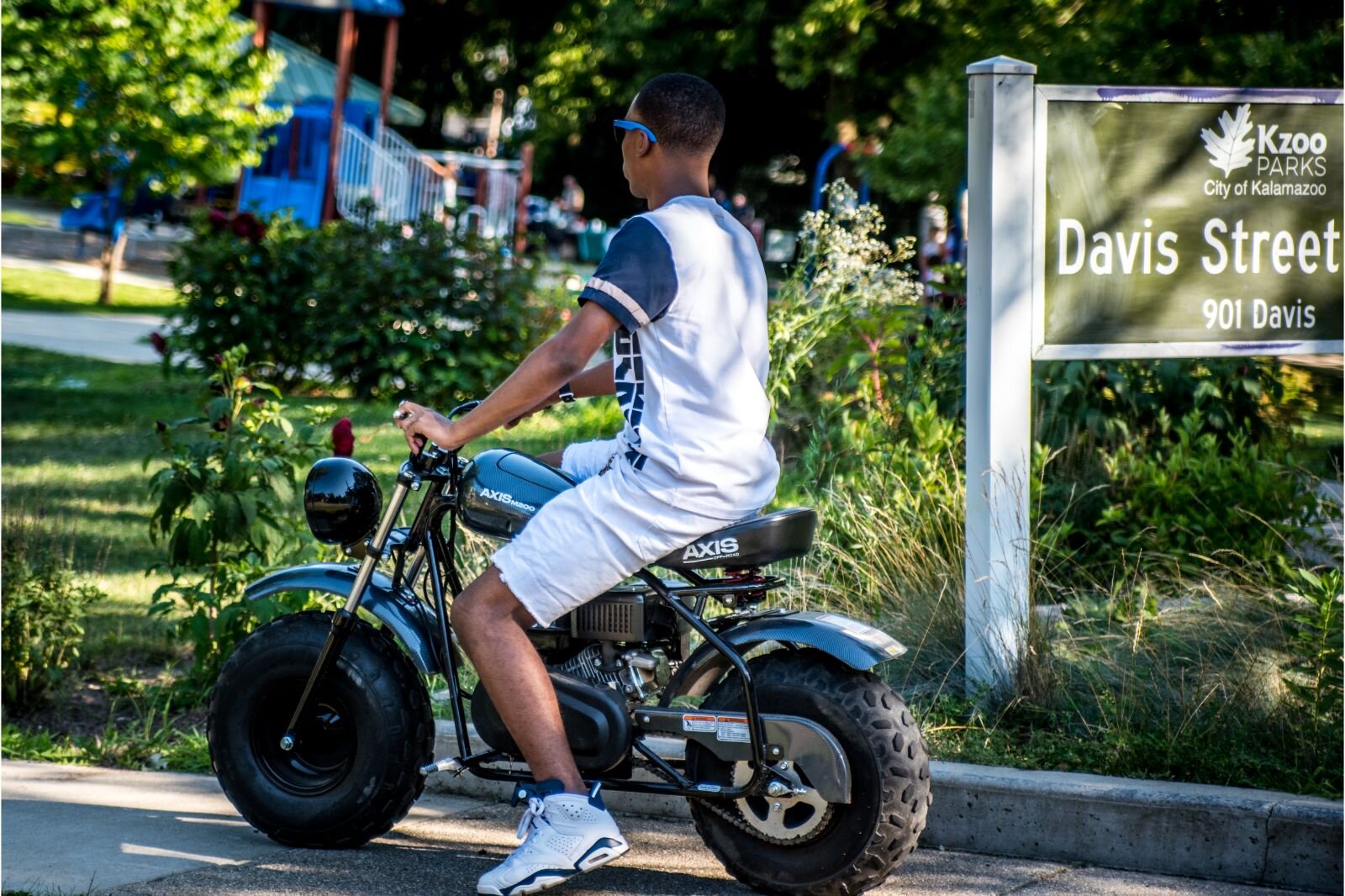 Taking a ride at the Davis Street Park. Photo by Fran Dwight.