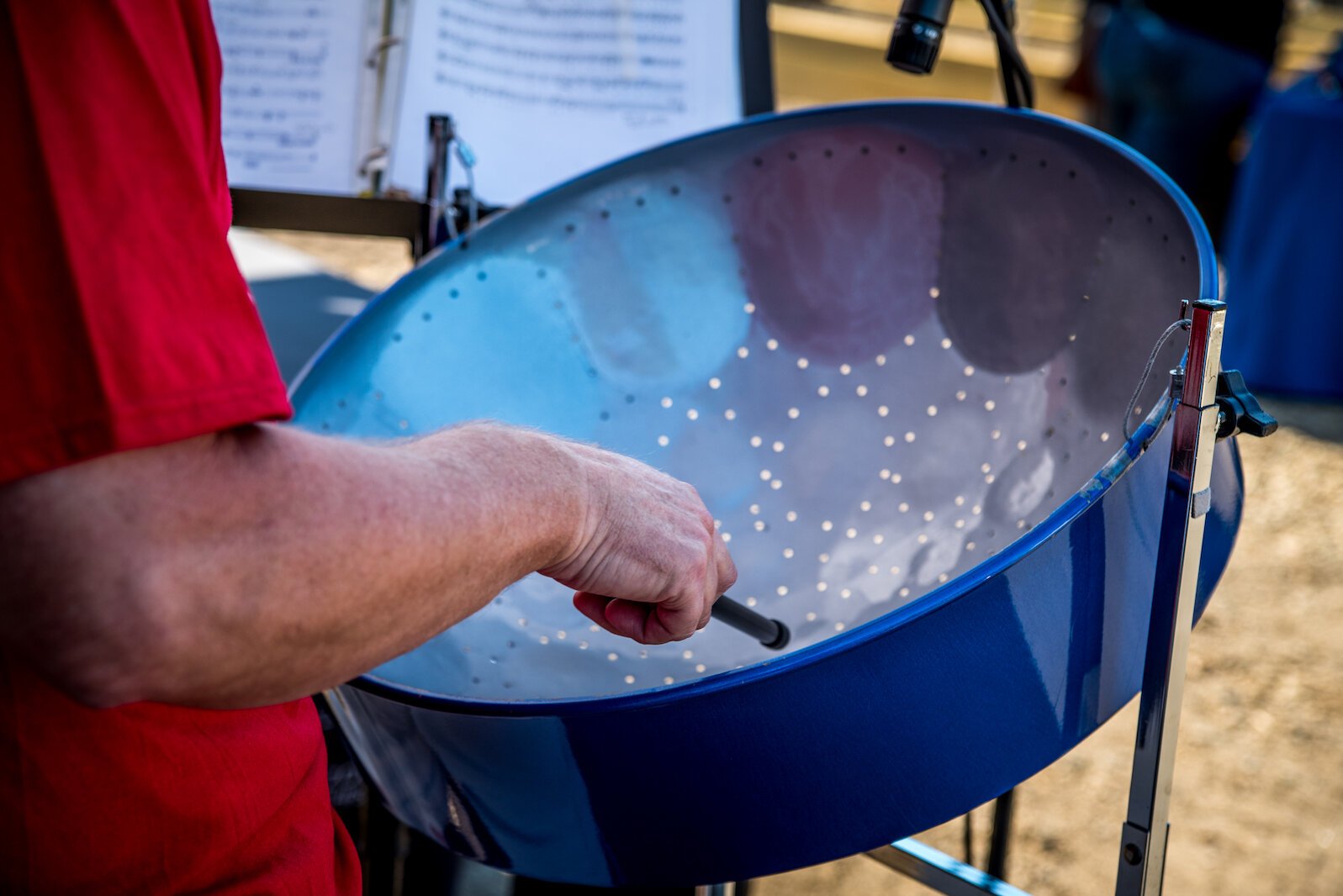 Greg Secor, a percussionist with the Kalamazoo Symphony Orchestra, plays steel drums at Edison Neighborhood's 2022 National Night Out. Photo by Fran Dwight