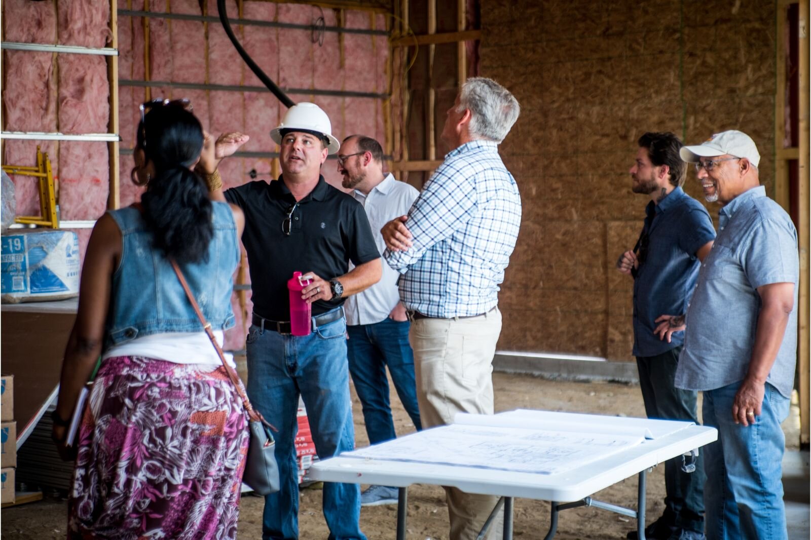 Project Manager Ryan Vlietstra of Glas Associates, explains the energy-efficient, condominium project during a tour of the unfinished 1601 East Main St. condominium property on Wednesday, August 23, 2023.