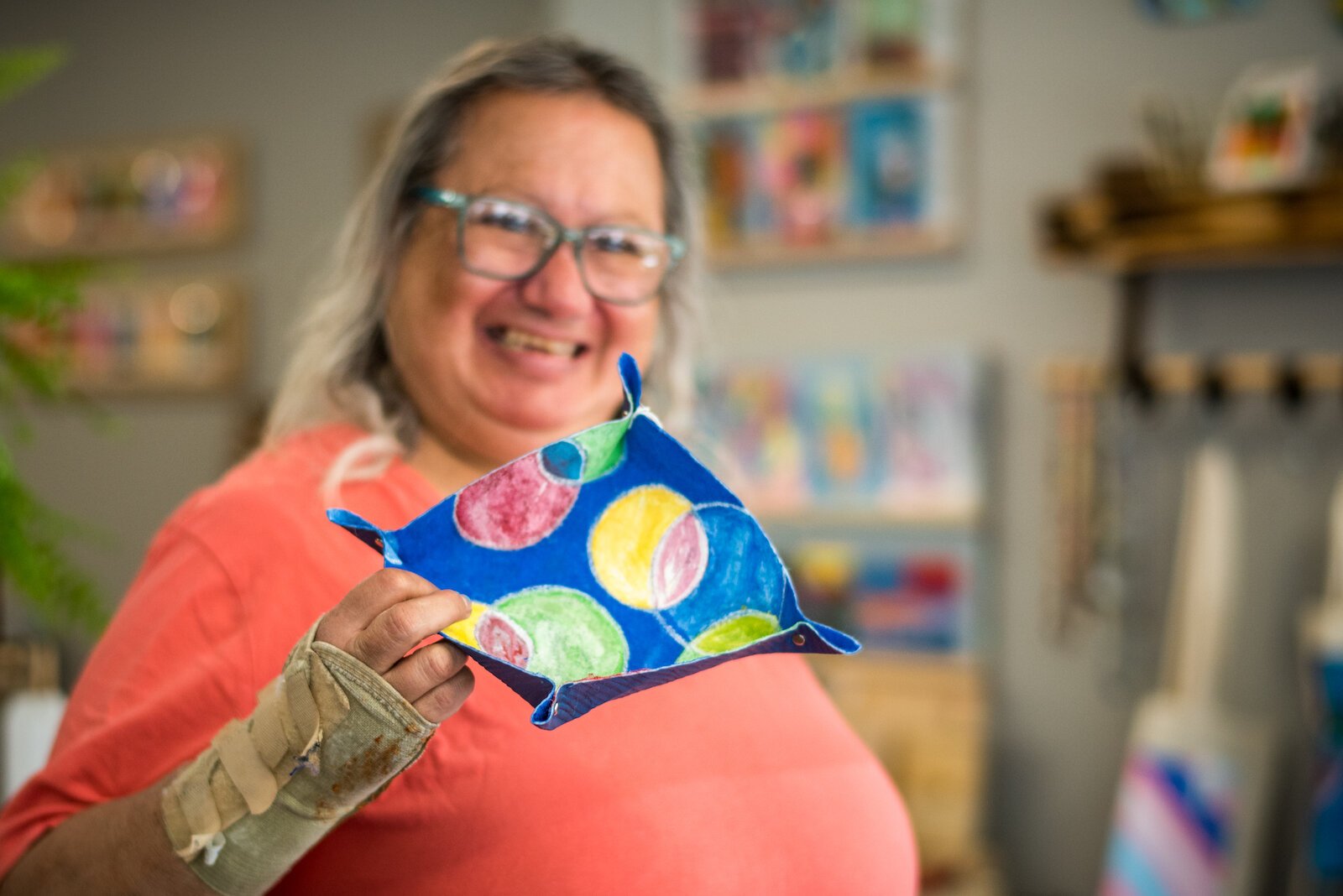 Joan Ruiz, an artist at artWorks, loves vibrant colors.