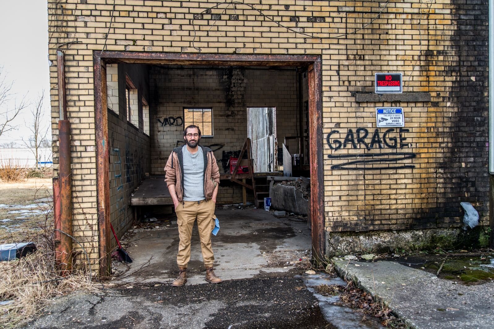 Matthew Schmidt, a former U.S. Marine, says he uses his best authoritative voice to scare away would be dumpers behind his building at 1809 Reed Street.