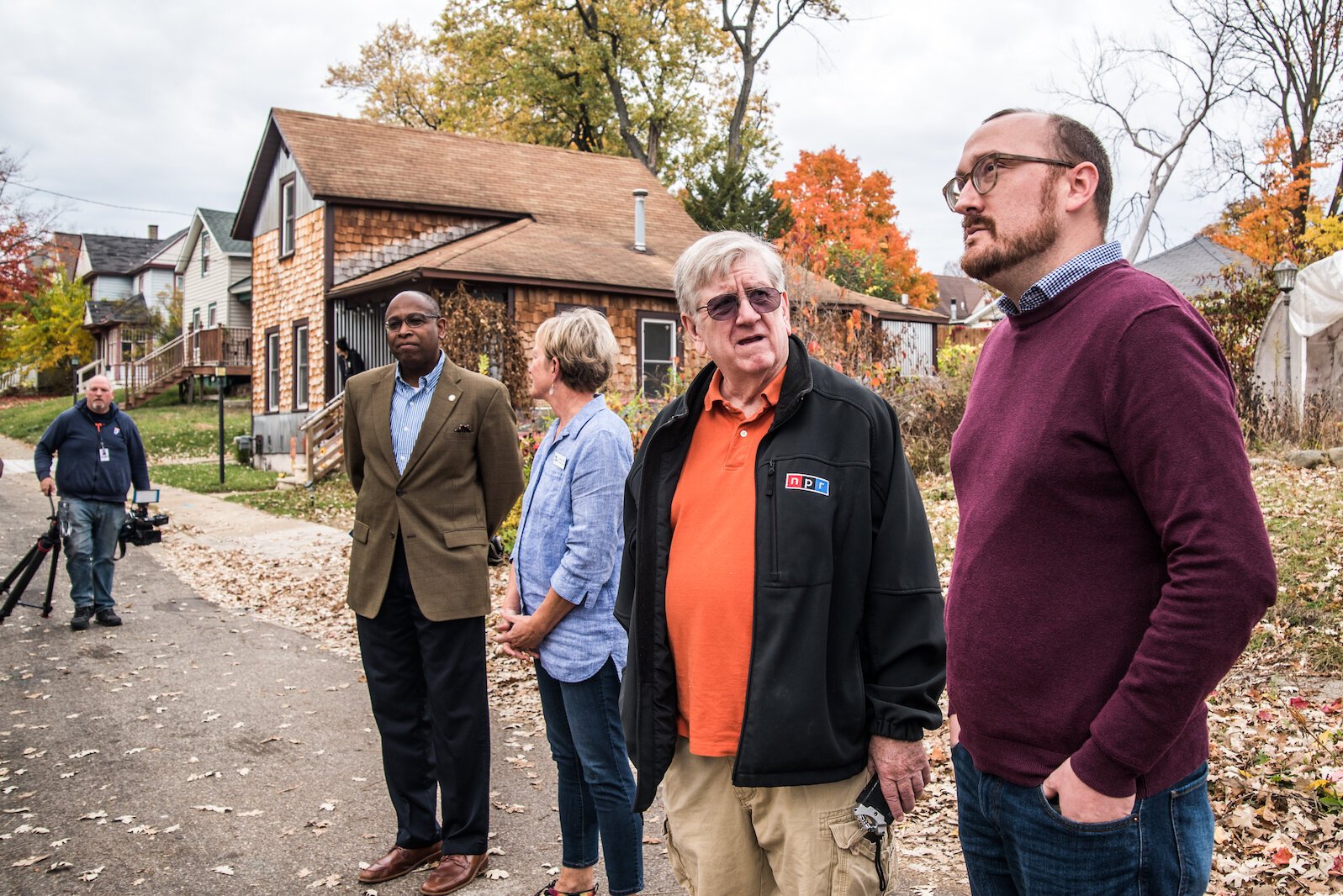 Kalamazoo City Commissioner Chris Praedel, right, talks with the media when officials with the City and development partners hosted an open house on Tuesday, Oct. 25, 2022, at a new housing duplex at 203–205 Wall Street in the Vine Neighborhood.