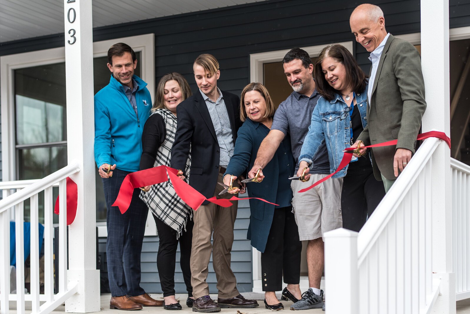 Some of the partners in the development of 203-205 Wall St. participated in a ceremonial ribbon-cutting on Tuesday, Oct. 25, 2022. 