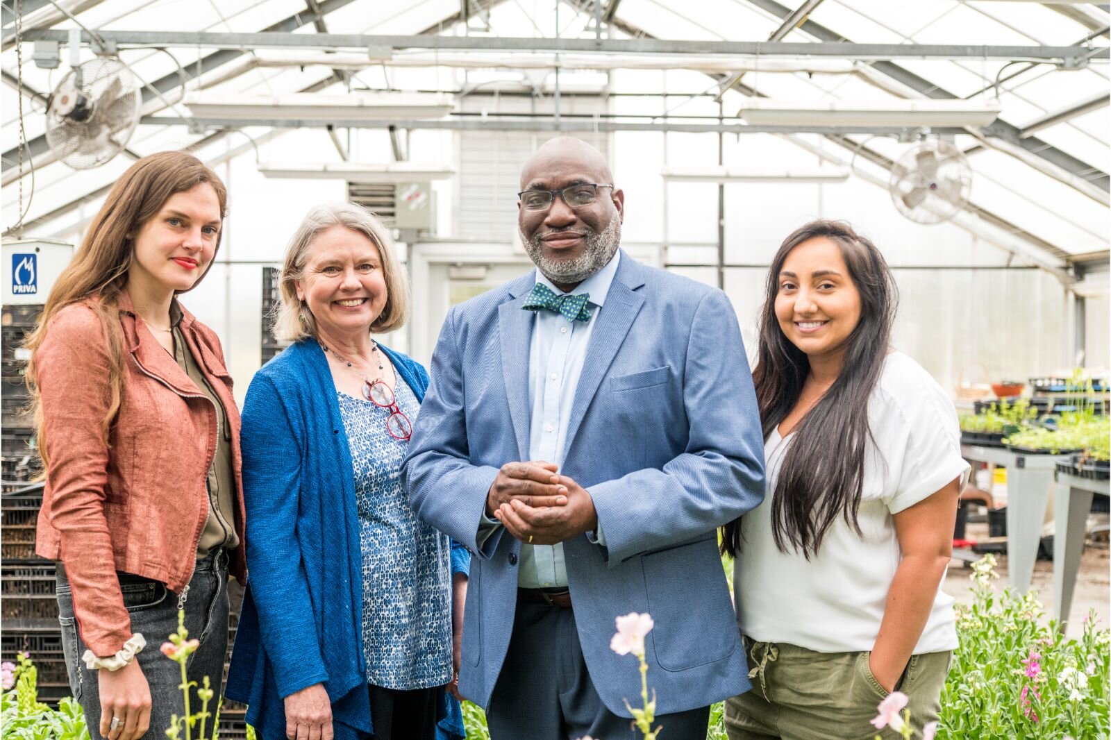 The Land Bank staff: Anna Roeder, Administrative Assistant; Theresa Coty O’Neil, Assistant Director; Sidney Ellis, Executive Director; and Reality Rojas, Project Manager.