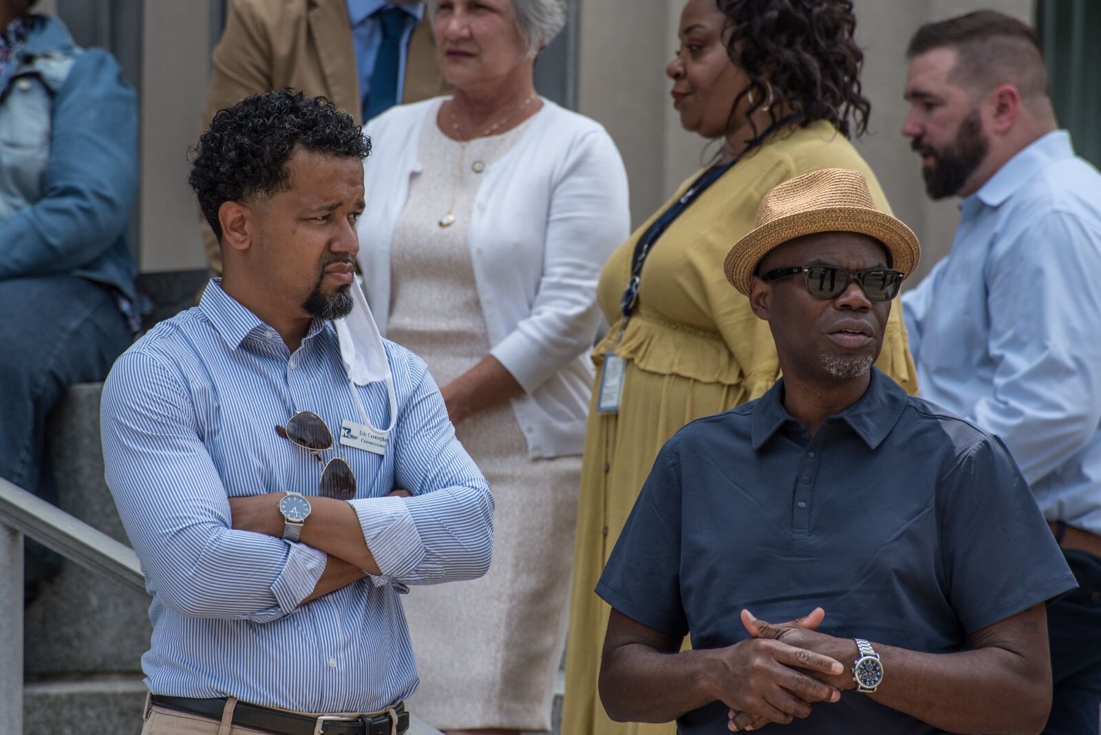 Kalamazoo City Commissioner Eric Cunningham and Shared Prosperity Kalamazoo Project Coordinator Kevin Ford on the city hall steps before a press conference in front of Kalamazoo City Hall.