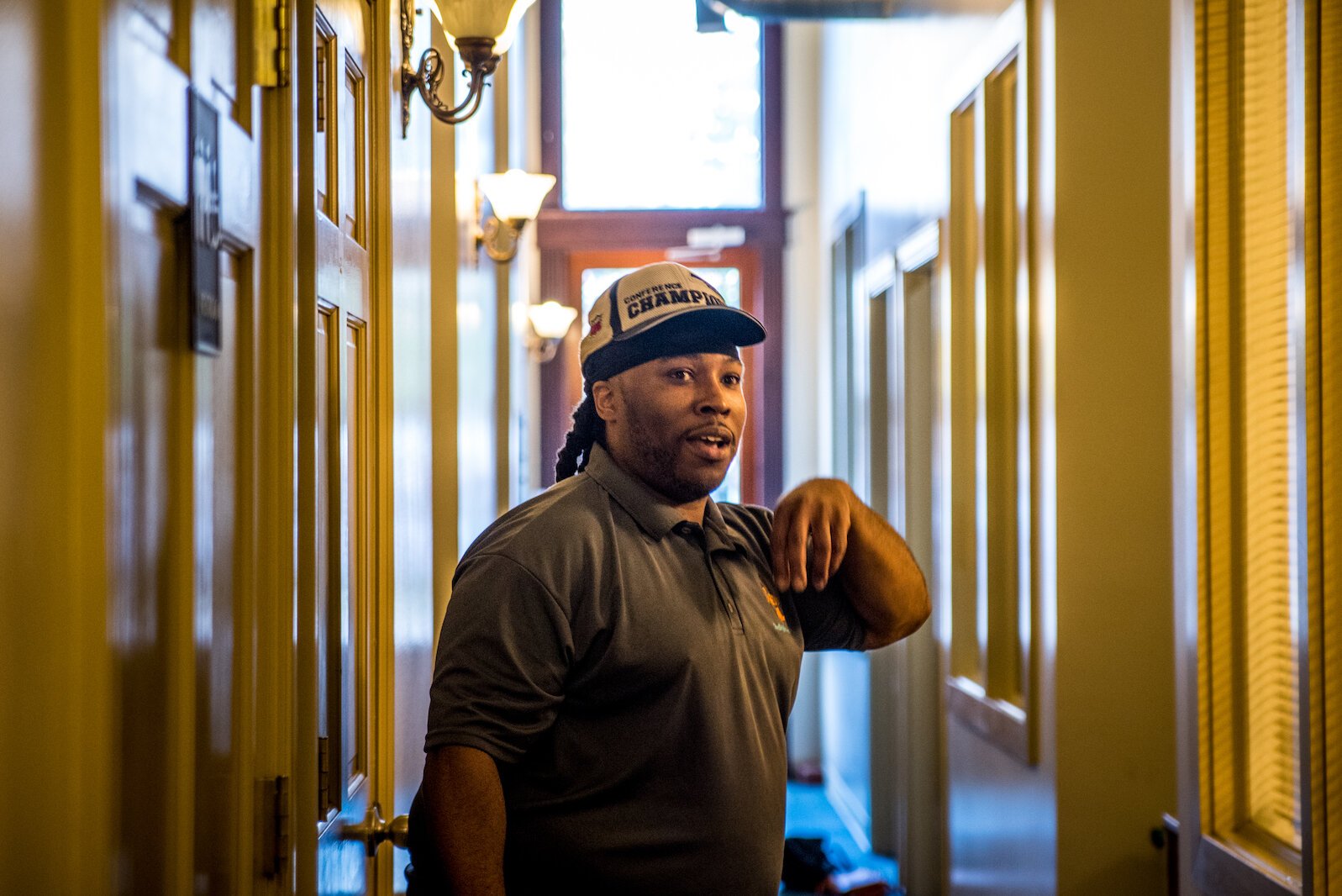 Roosevelt Lee-Fleming stands in the hallway of some of the space used by The Drip Sneakers at 315 N. Burdick St. in downtown Kalamazoo.