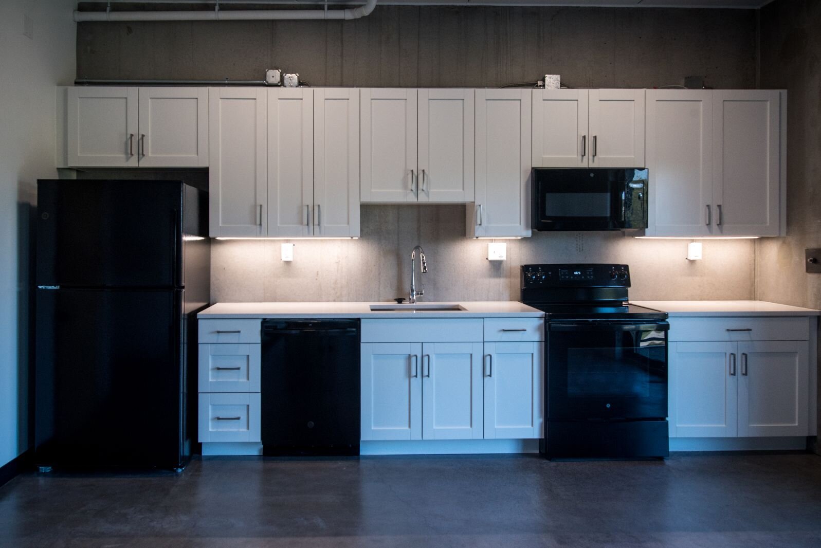 Each apartment unit has a full array of kitchen appliances.