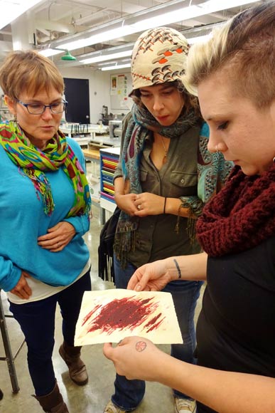 Artists in residence check out print experiment