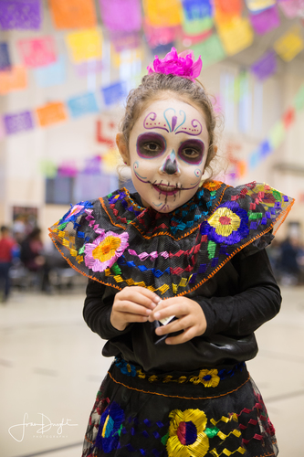 Celebrating Dia de los Muertos. Photo by Fran Dwight