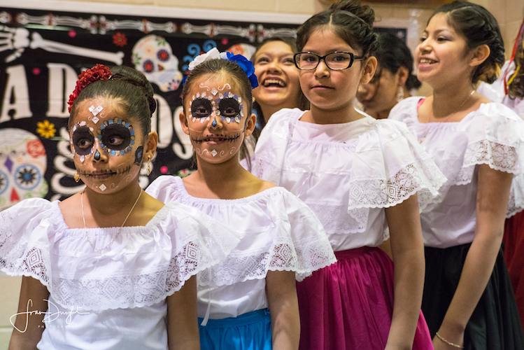 Celebrating Dia de los Muertos. Photo by Fran Dwight