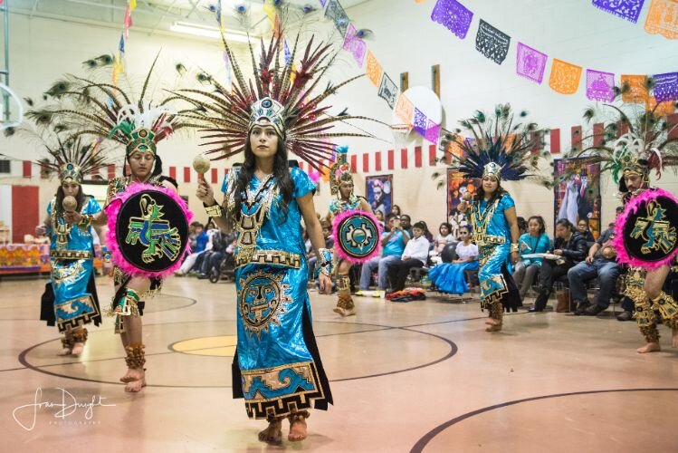 Dances and costumes celebrate regional traditions as part of Día de los Muertos observances.