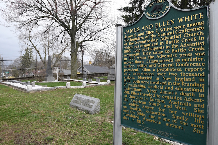 A historic marker identifies the gravesite of James and Ellen White, two of the founders of the Seventh Day Adventists  