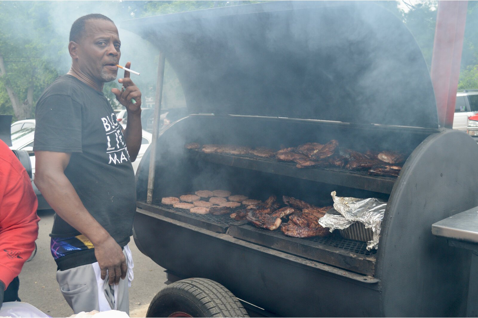 One Man and a Grill was filling the air with the smoke of about a ton of rib tips, hamburgers, chicken, and more. Michael Wilder of Group Violence Intervention and Peace During War says the rally was all about peace smoke, the smoke of BBQ grills.