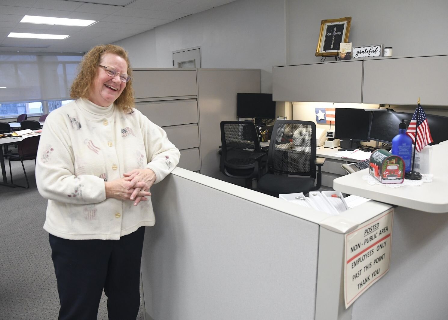 Teri Loew, Chief Deputy Clerk of Elections for Calhoun County, stands inside her office.