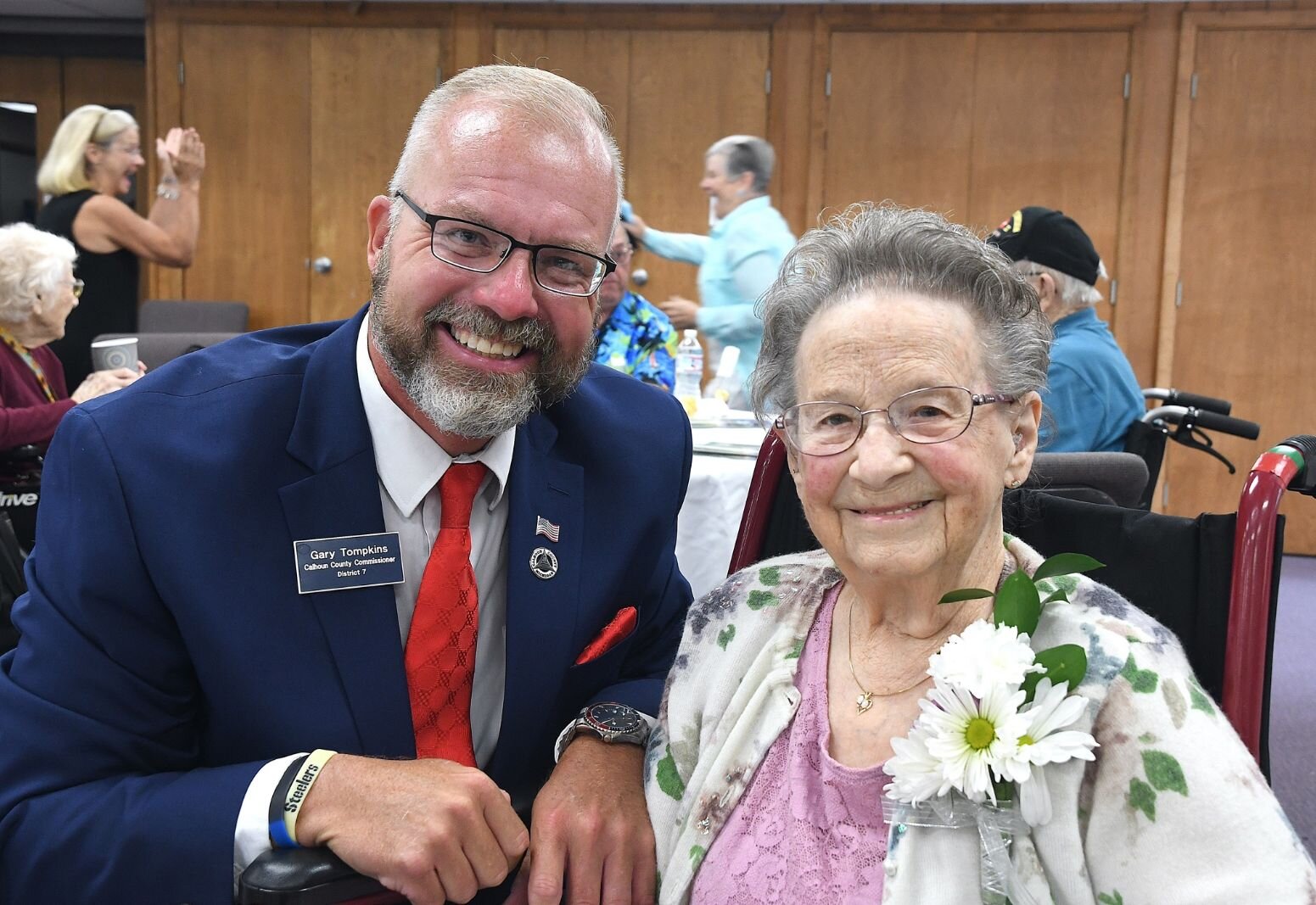 Gary Tompkins, Calhoun County Board member, poses for a photo with Stella Ingraham, 101, of Homer.