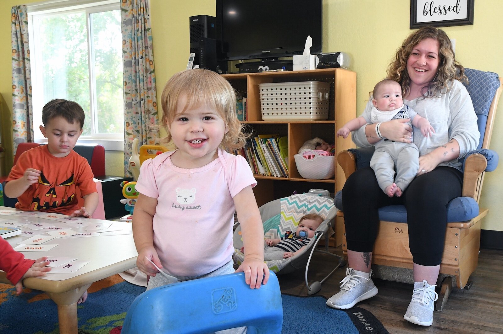 Seen from left are Jaxon Meek, Riley Furguson, Jett Spicer, and Nathan Cook, being held by Skylee Kosarue at Rose of Sharon Child Development Center.