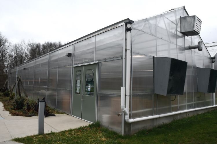 An outside view of the greenhouse at the Pine Creek Indian Reservation.