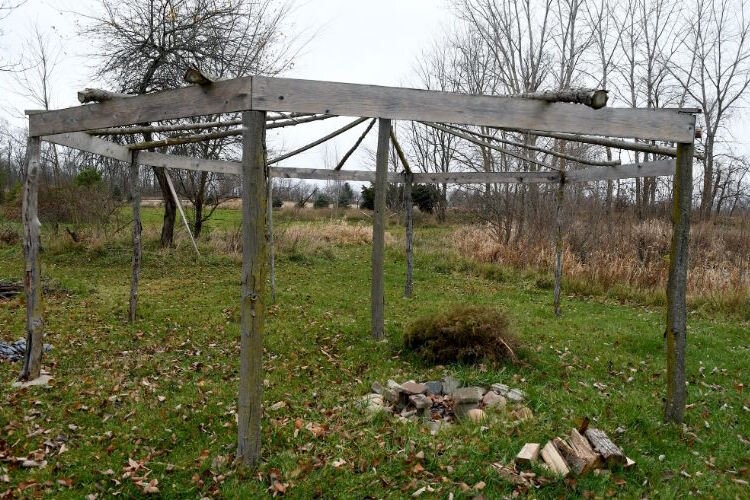 The arbor is the focal point of the Tribe’s Wild Rice Processing Camp, a traditional community event held in early September. The fire ring is the location at which wild rice is parched, which is the step prior to threshing and winnowing. 