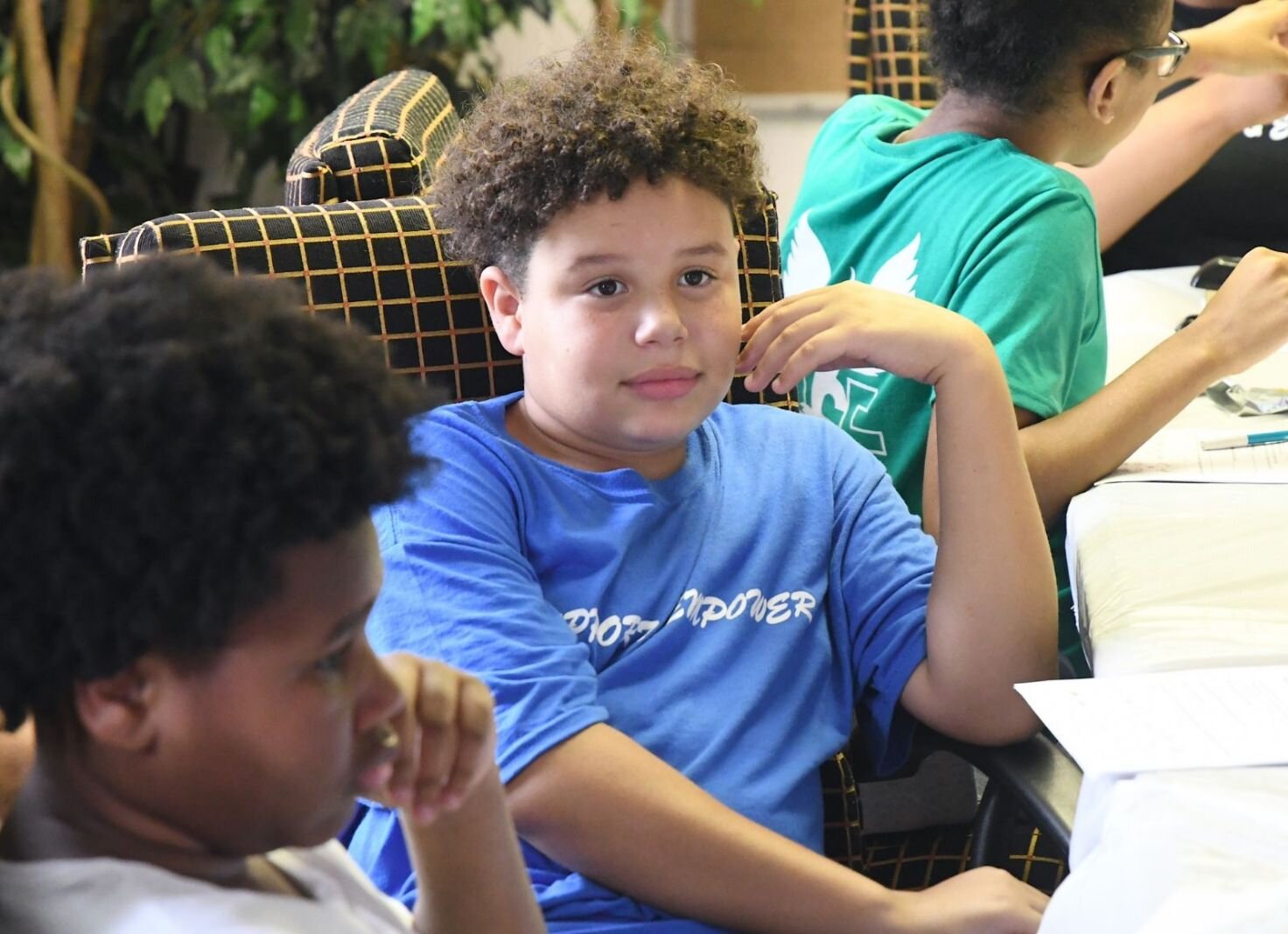 Derrick Gibson, 10, listens to the instructor during a RISE summer program session.