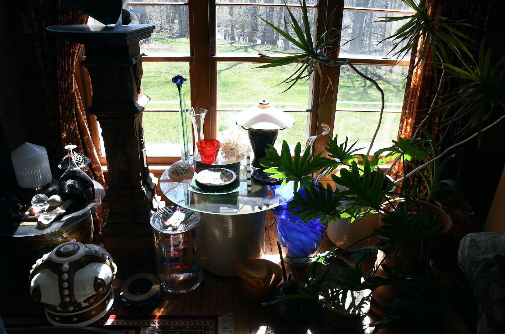 Looking out a window of Andrew Freemire’s home to the Wanadoga Creek.