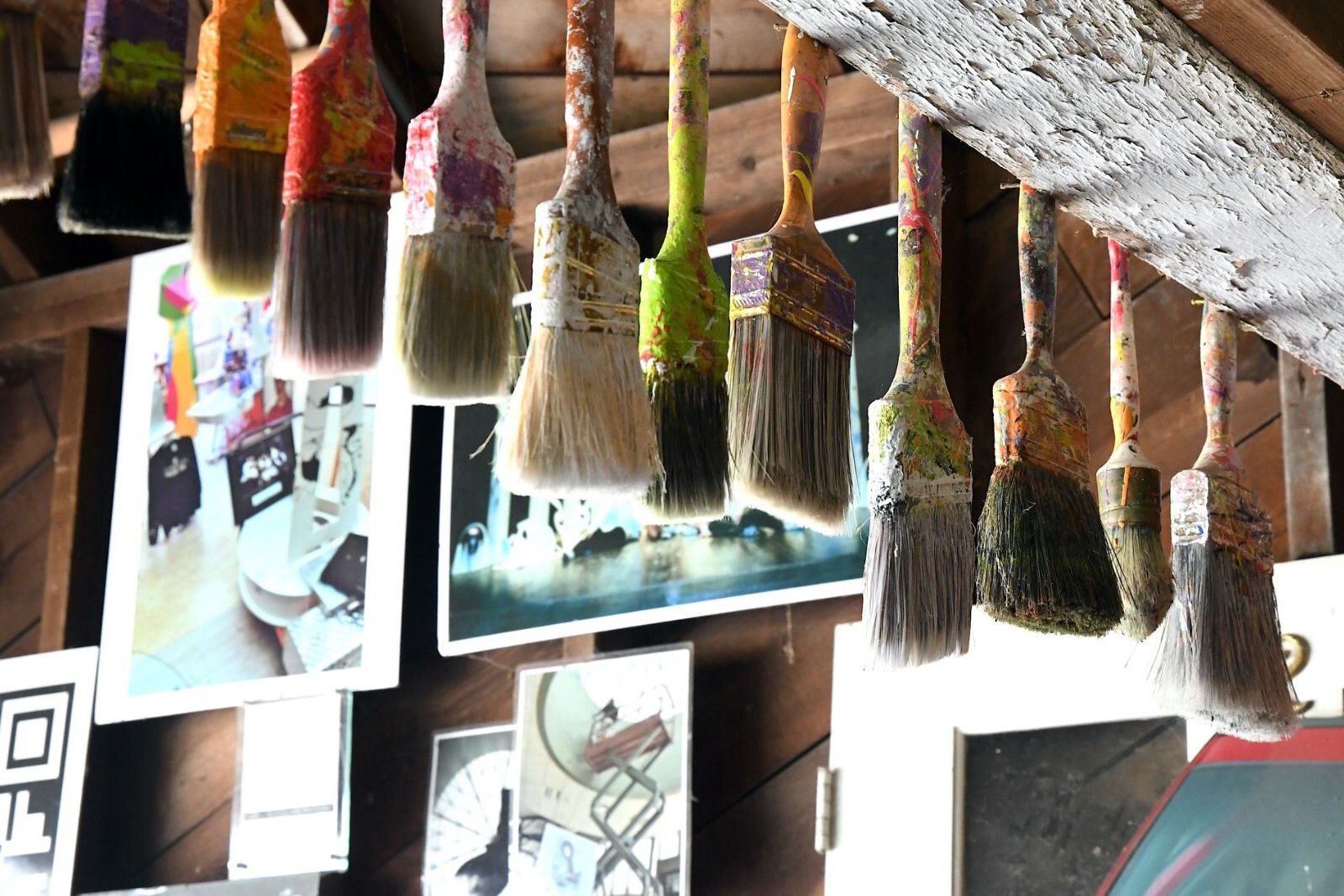 Some of Andrew Freemire’s paint brushes in his garage