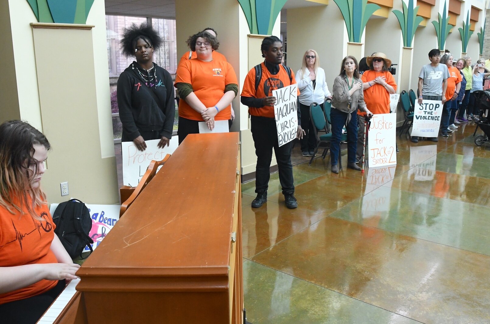 Karrah Jackson, plays the national anthem prior to an anti-gun violence rally at First Congregational church in downtown Battle Creek.