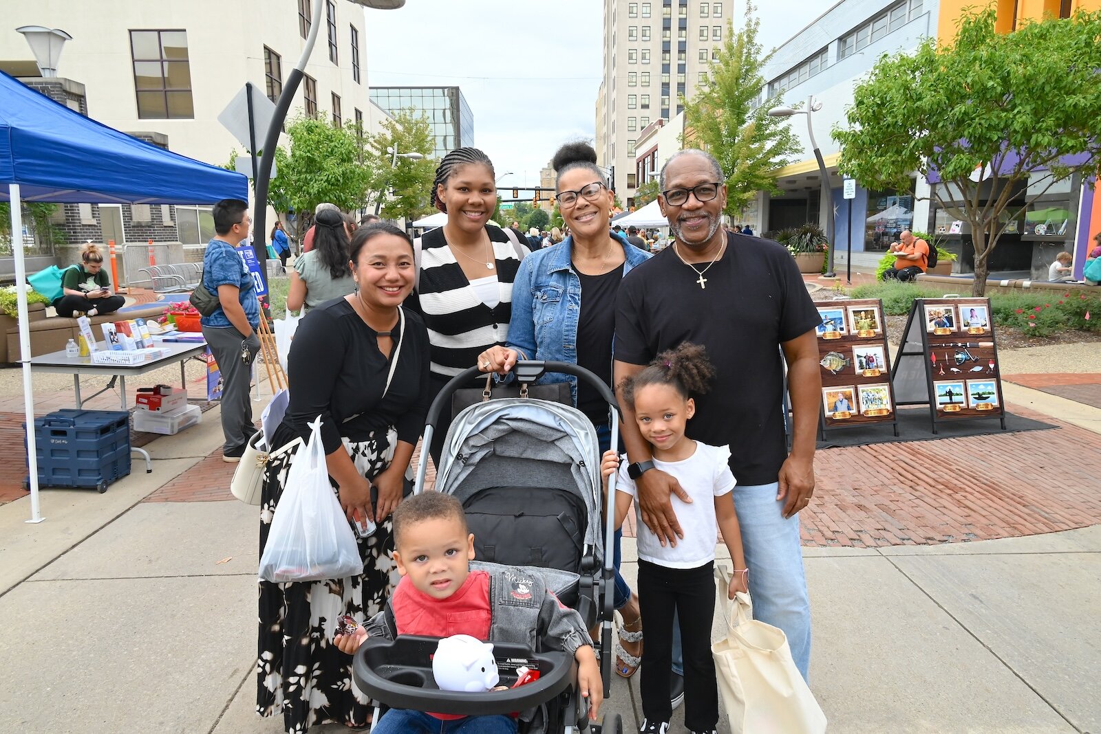 Seen at the BCCF’s block party are from left, Tha Tin Par, Ty’Asia Reese, Victoria Reese, Tim Reese, and in the front Tru and Teagan Reese.