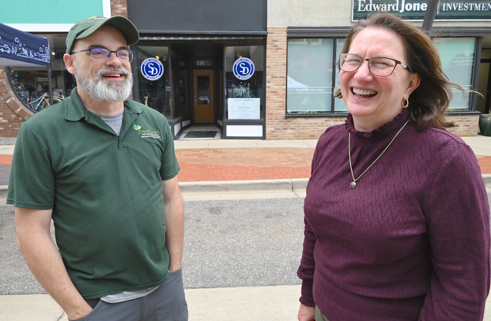 Robert Elchert of the SHARE Center and Helen Guzzo of the City of Battle Creek are seen at the BCCF’s block party.
