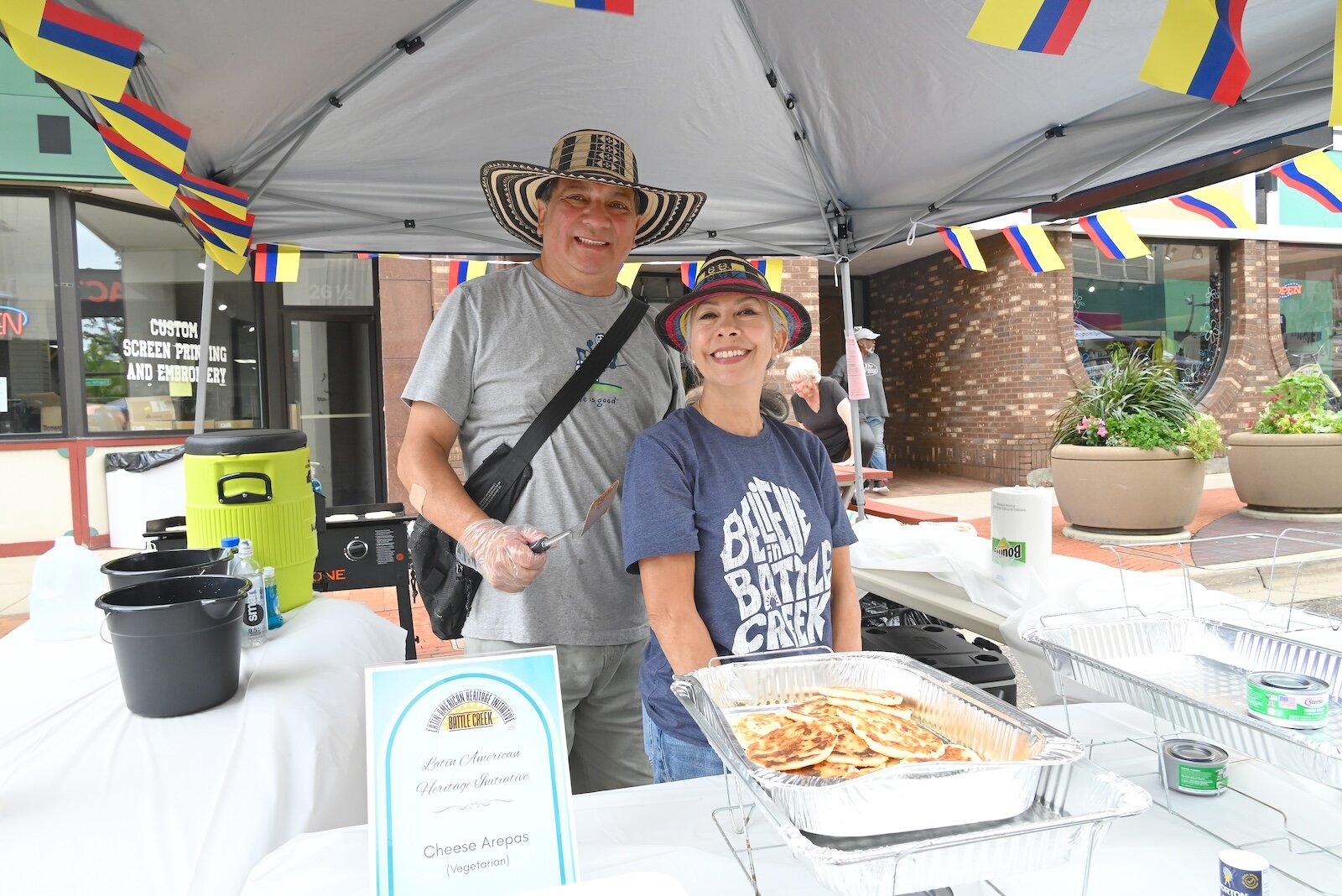 Jesus Grillo and Lucy Mosquera of Nueva Opinión are seen at the BCCF’s block party.
