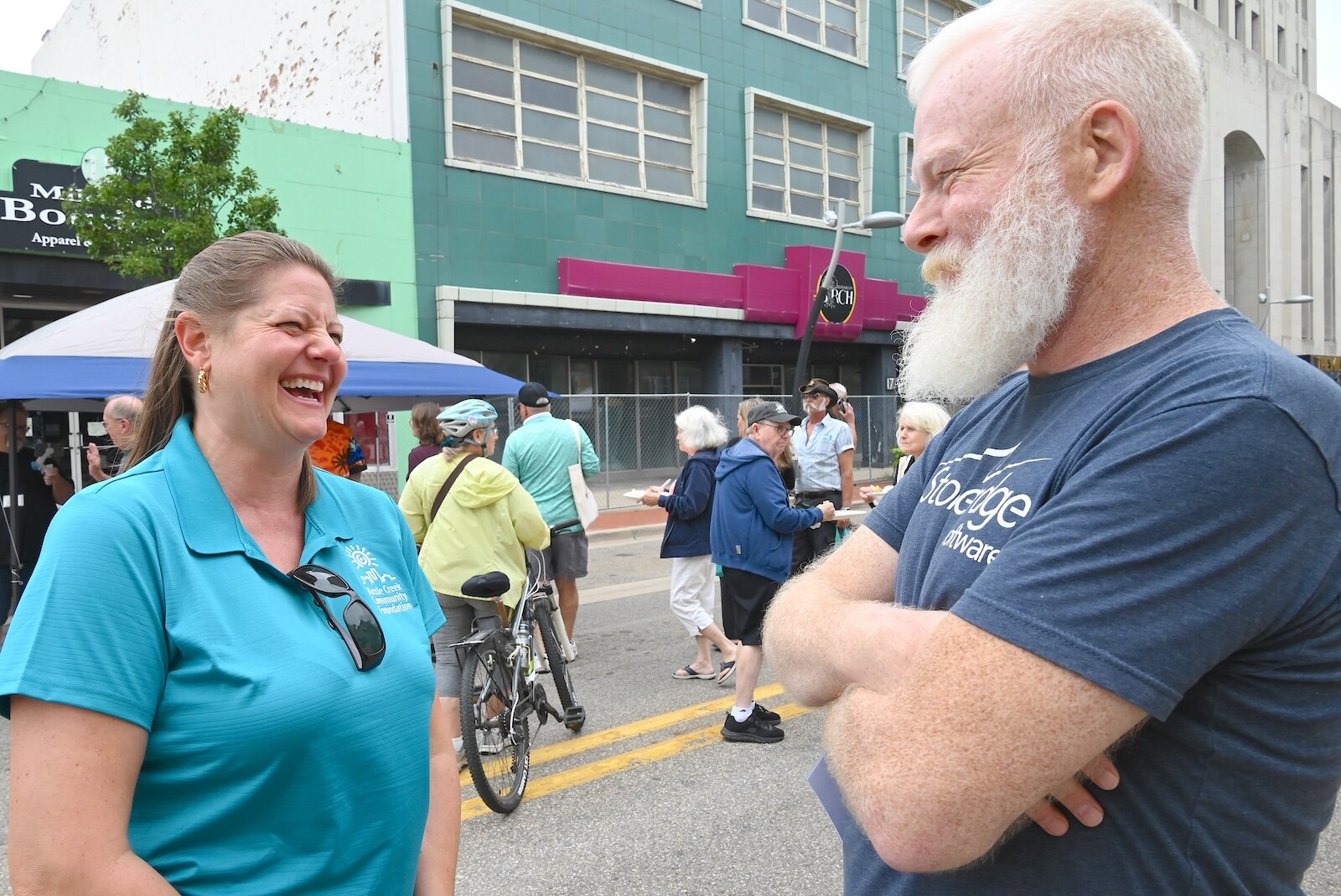 Michelle Fuller, a board member of the BCCF, and Patrick Barnett, President of the Kingman Museum board, talk at the block party.