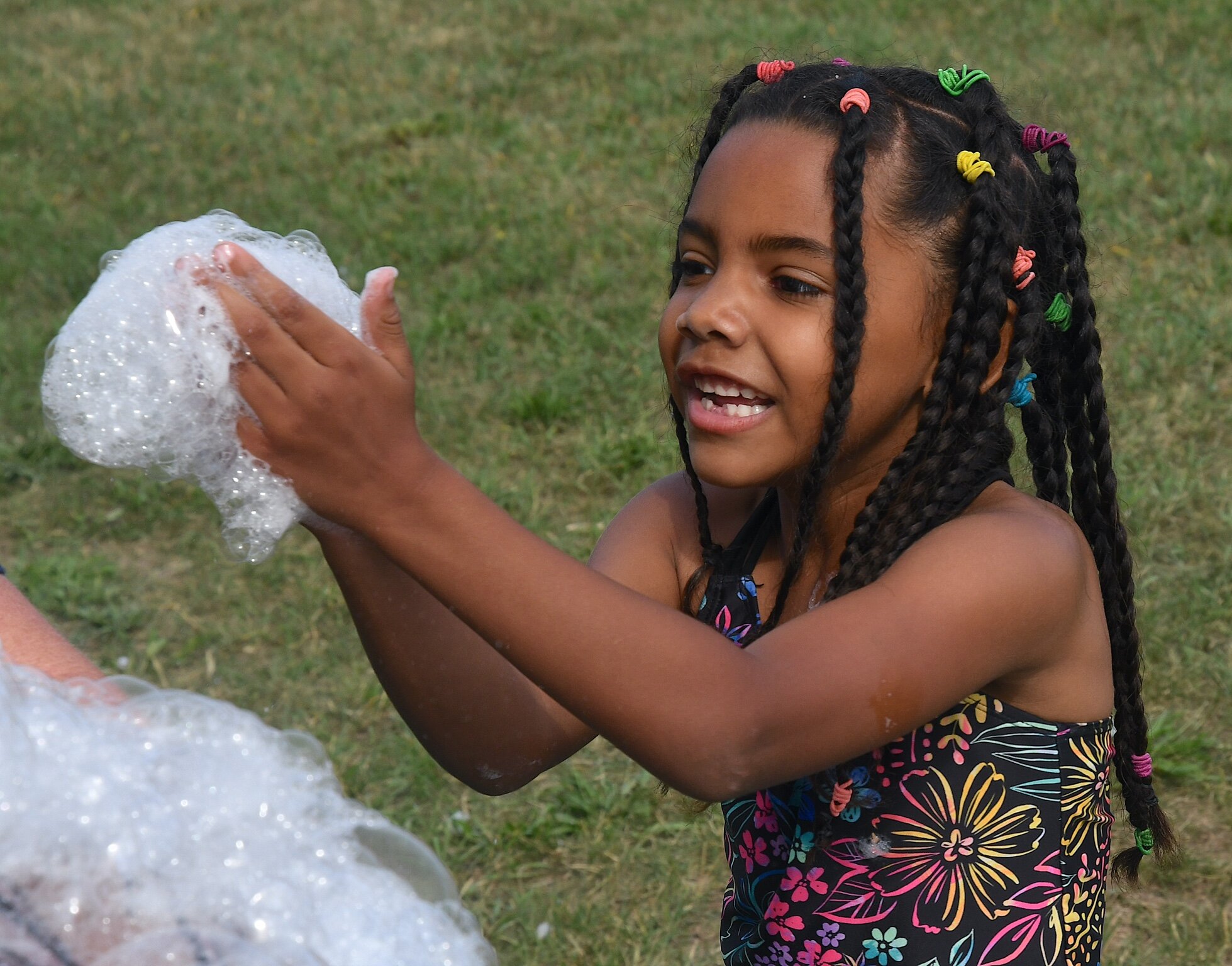 Aubrielle Shelton has fun with bubbleds during a morning session at Franklin-Post Elementary School.